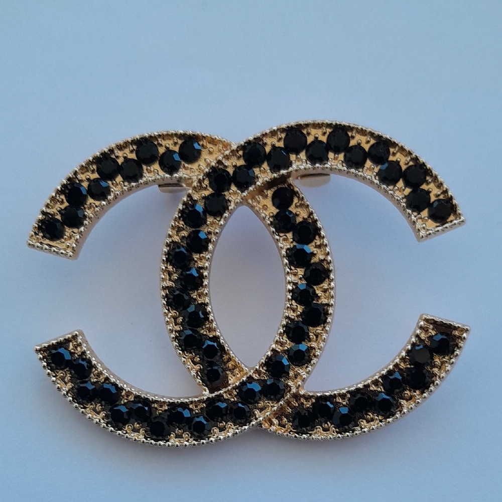 Gold-Tone Brooch with Black Crystals -